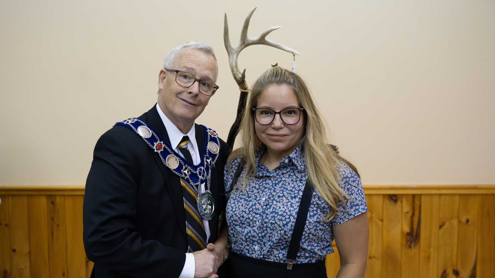 Regional Chair and CEO John Henry and Chief Kelly LaRocca shake hands at the signing of the Bilateral Agreemenr