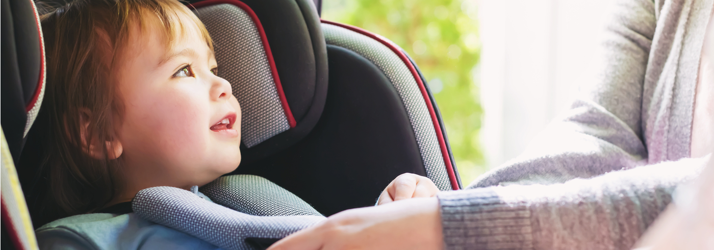 Toddler in booster seat Toddler in booster seat