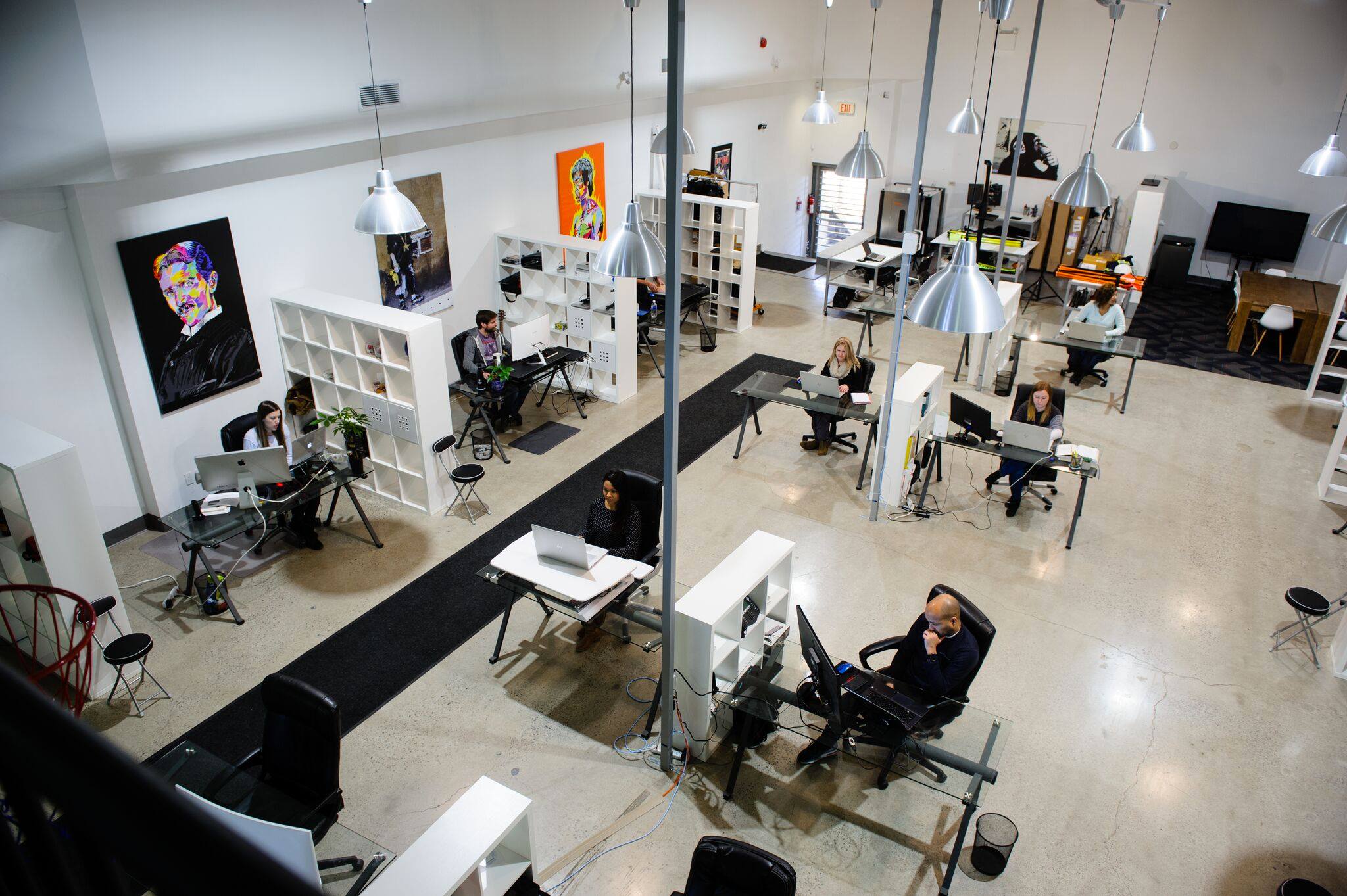 Aerial view of people working on computers at geekspeak Commerce in Whitby, Ontario