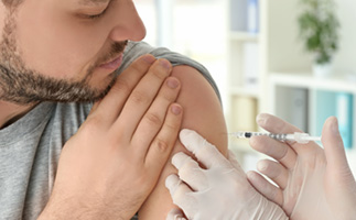 Man getting a vaccine.