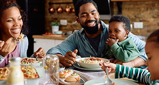 Young family at the dinner table