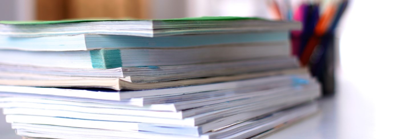 Stack of reports on a desk