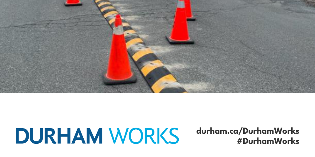 A photo of a hardened centre line with pylons surrounding it, the Durham Works logo and text reading durham.ca/DurhamWorks #DurhamWorks 