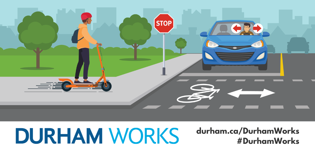 An animated image of a car with a person driving stopped at a stop sign, with a child on a scooter crossing the street. Text states: Durham Works, durham.ca/DurhamWorks, #DurhamWorks.