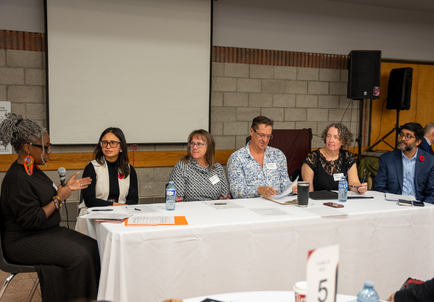 Panelists speaking at the Together Against Hate Durham Conference