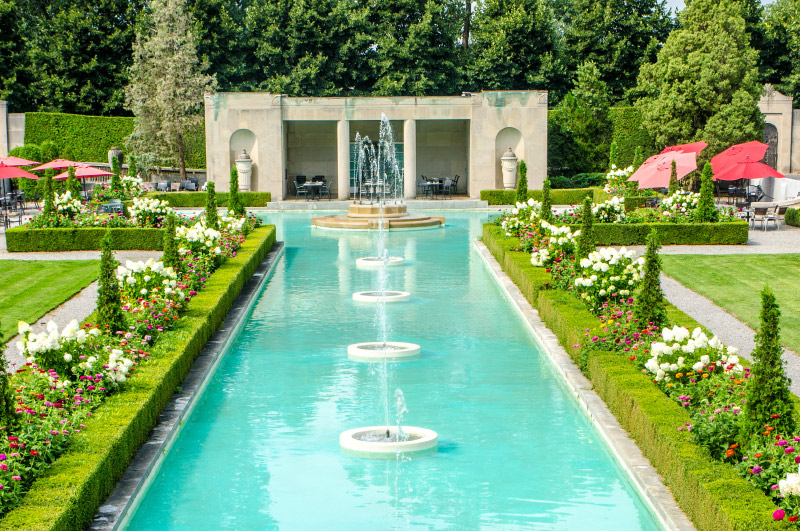 Beautiful fountains at Parkwood in Oshawa with a patio in the background,