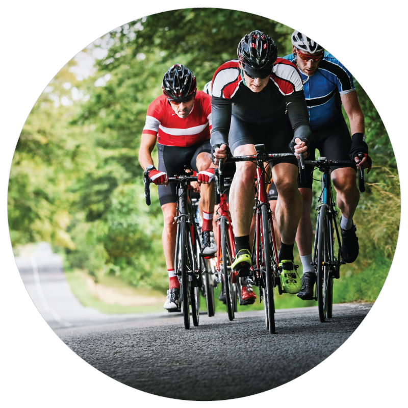 Group of advanced cyclist riding a steep road.