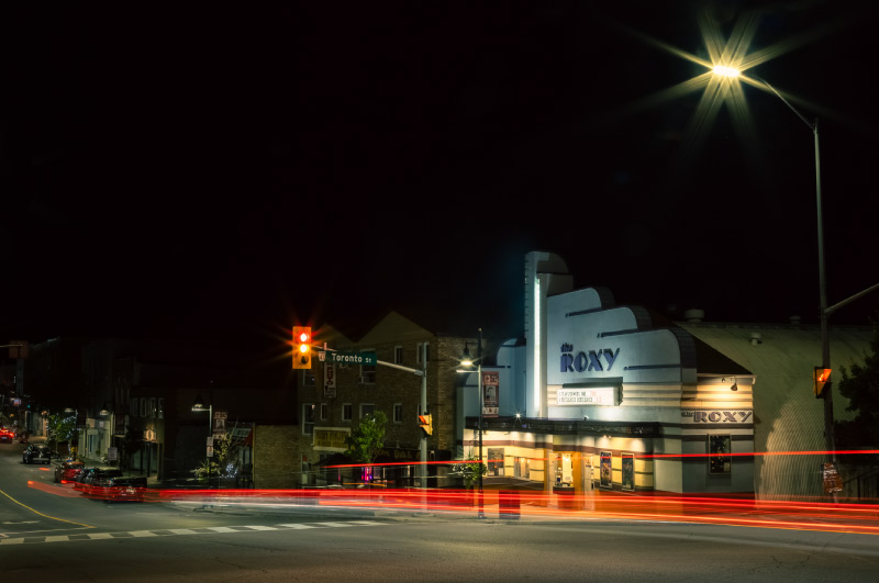 The Roxy Theatre at night with warm lights.