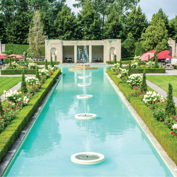 Beautiful fountains and garden with a teahouse restaurant in the distance at Parkwood Estate.