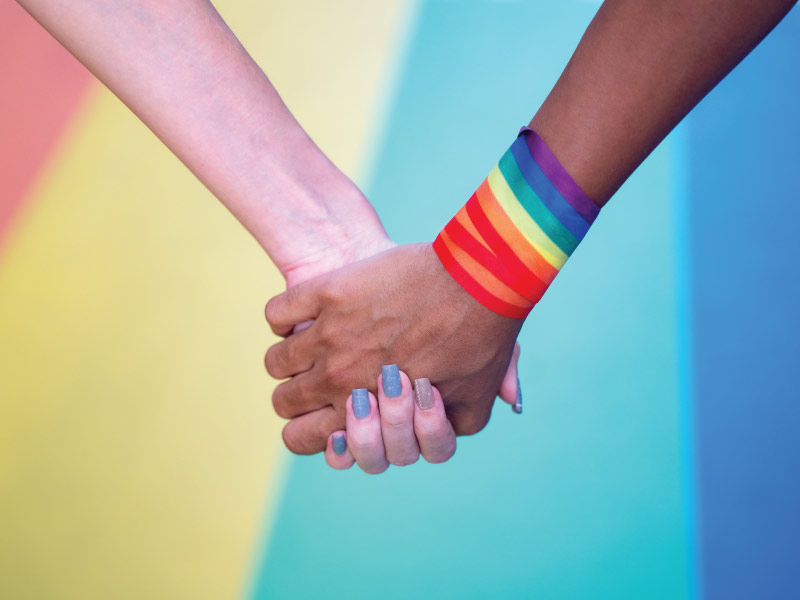 Close up of holding hands.